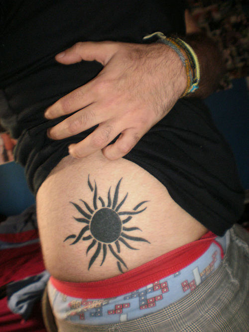 Black Tribal Sun Tattoo