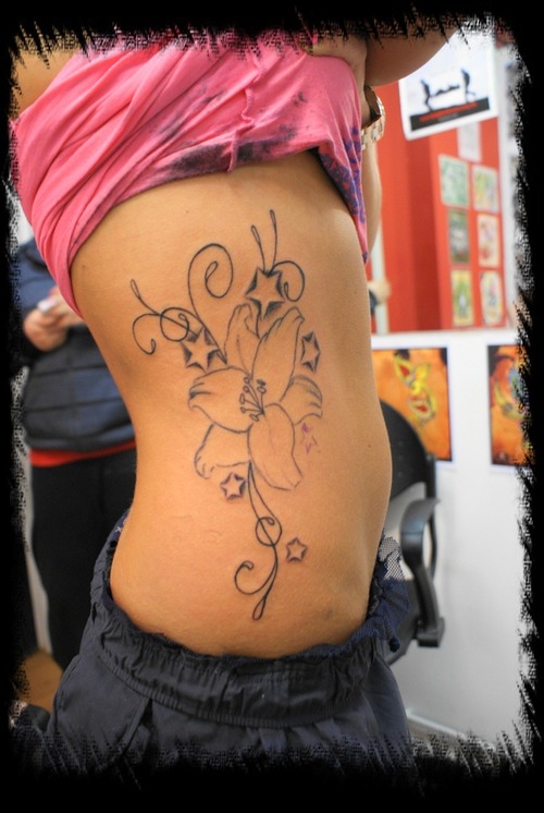 lily tattoo design. swirl tattoo designs. Lily