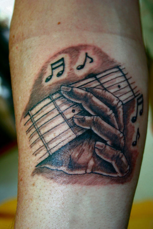 Cute Small Hand Tattoos Design guitars tattoo